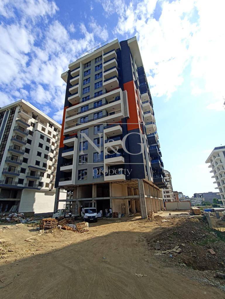 Новая квартира 2+1 в сданный комплексе в Махмутларе в 600м от моря